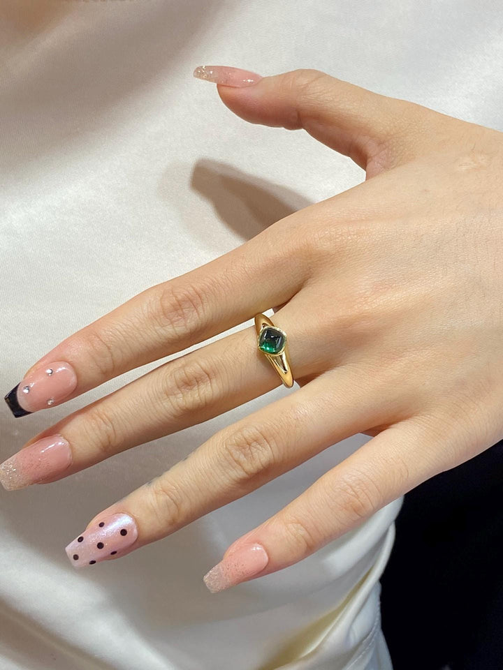 Built for the Spotlight Cushion Emerald Bypass Ring