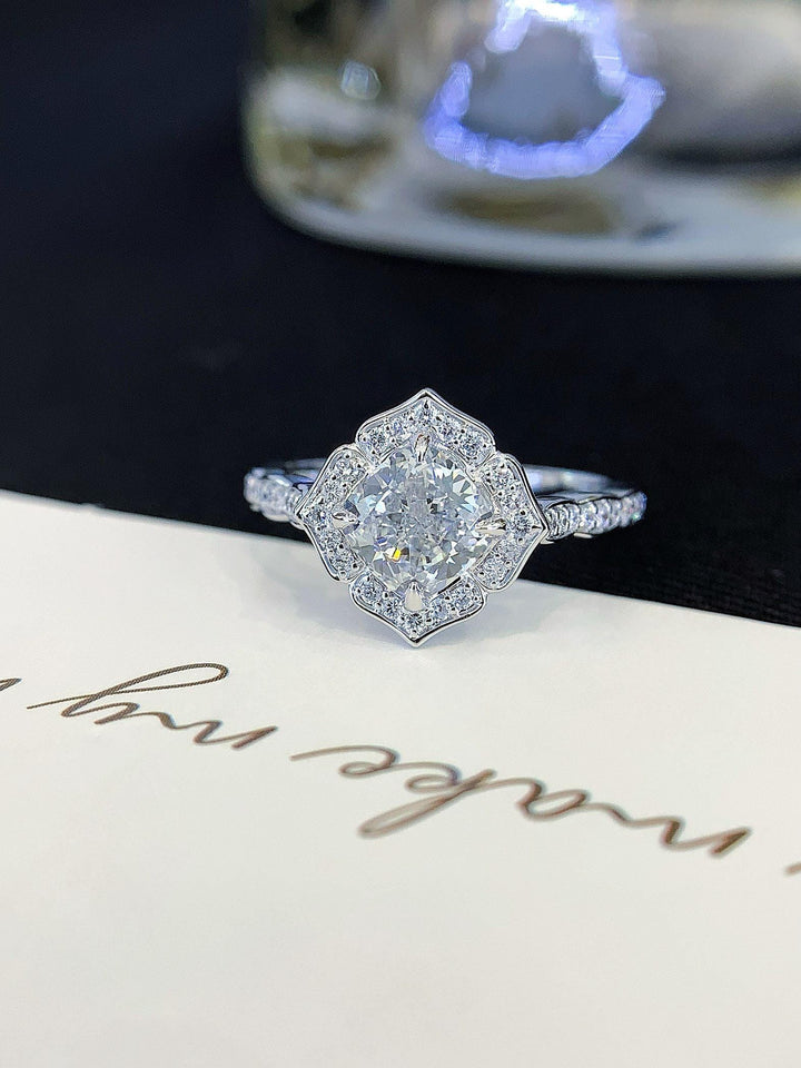 Soft Light, Lasting Brilliance Cushion Cut Floral Halo Ring