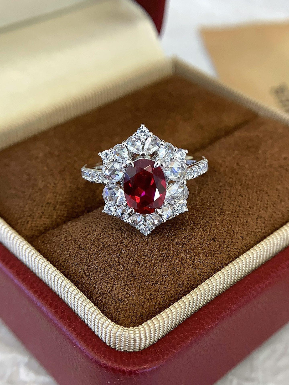 The Ring They'll Ask About Oval Ruby Halo Engagement Ring