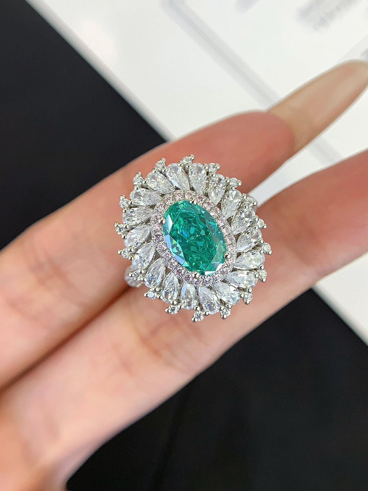 Pure Brilliance Oval Emerald Marquise Cluster Ring