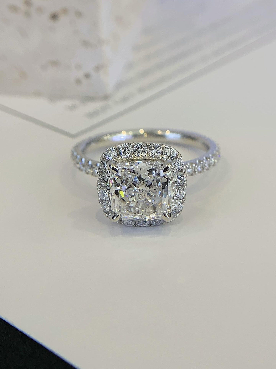 Soft Light, Lasting Brilliance Cushion Hidden Halo Ring