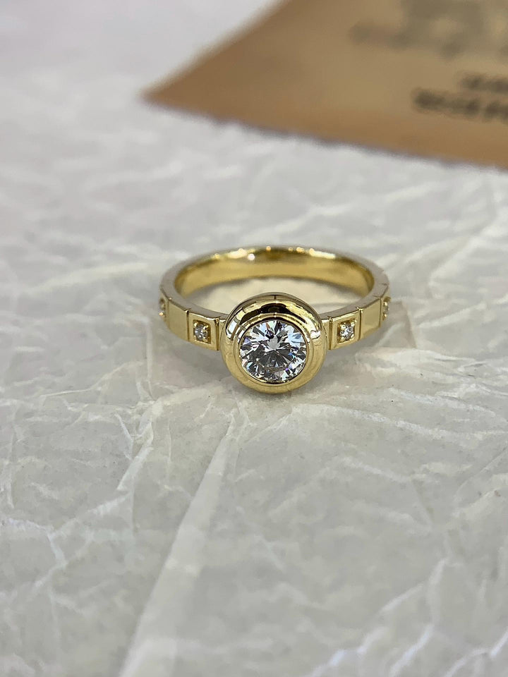 The Ring They'll Ask About Bezel Set Diamond Solitaire