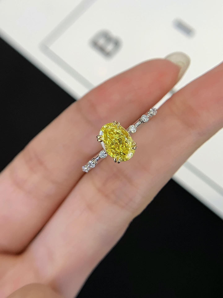 Love at First Light Oval Yellow Diamond Ring
