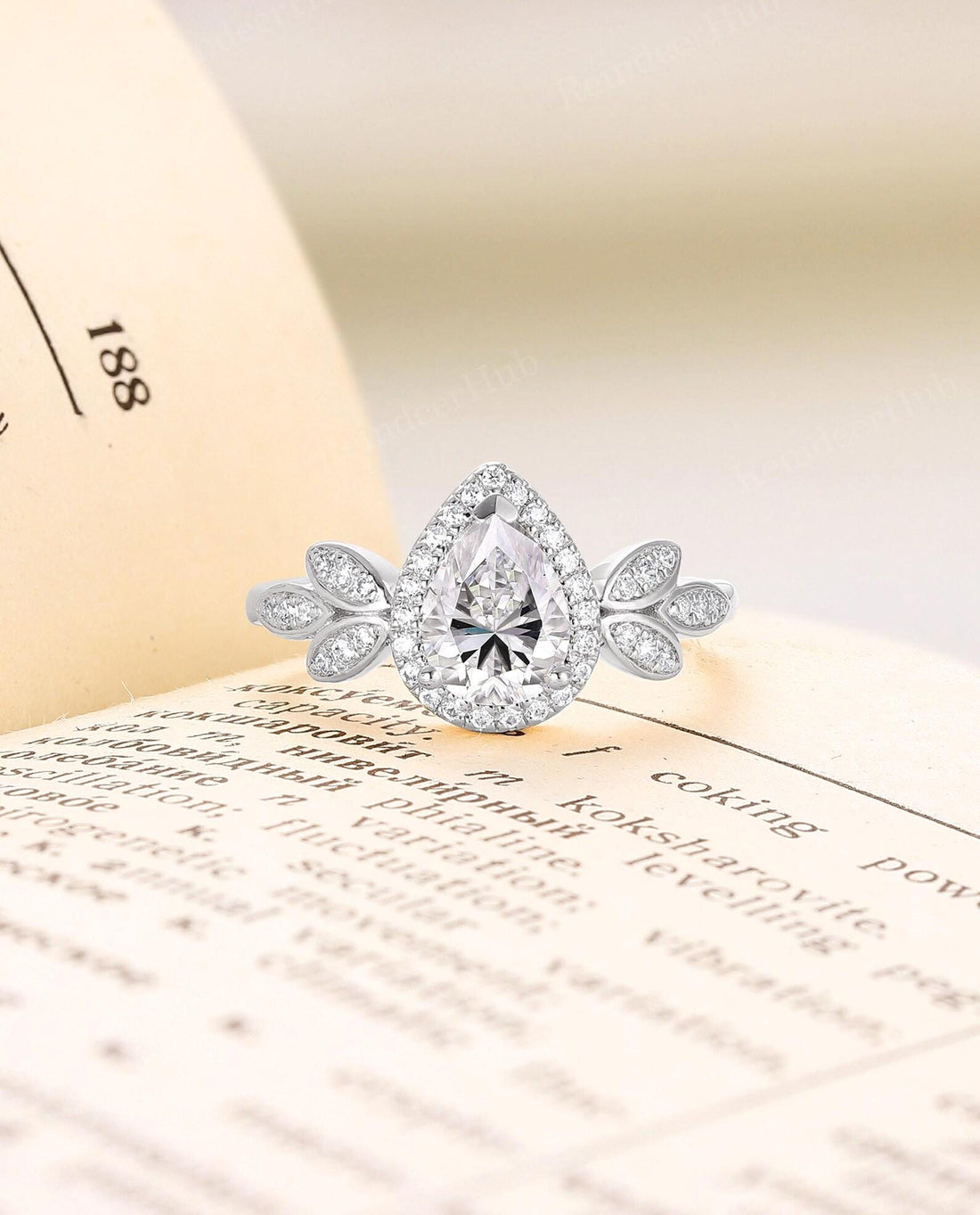 Worth Looking Twice Pear Diamond Leaf Halo Ring