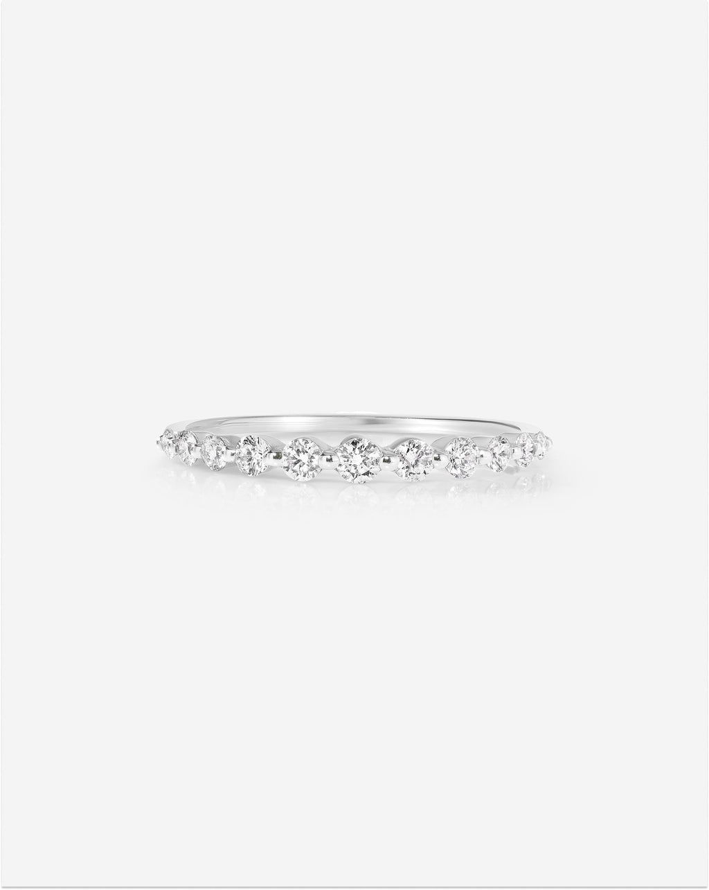 Graduated Single Prong Diamond Ring