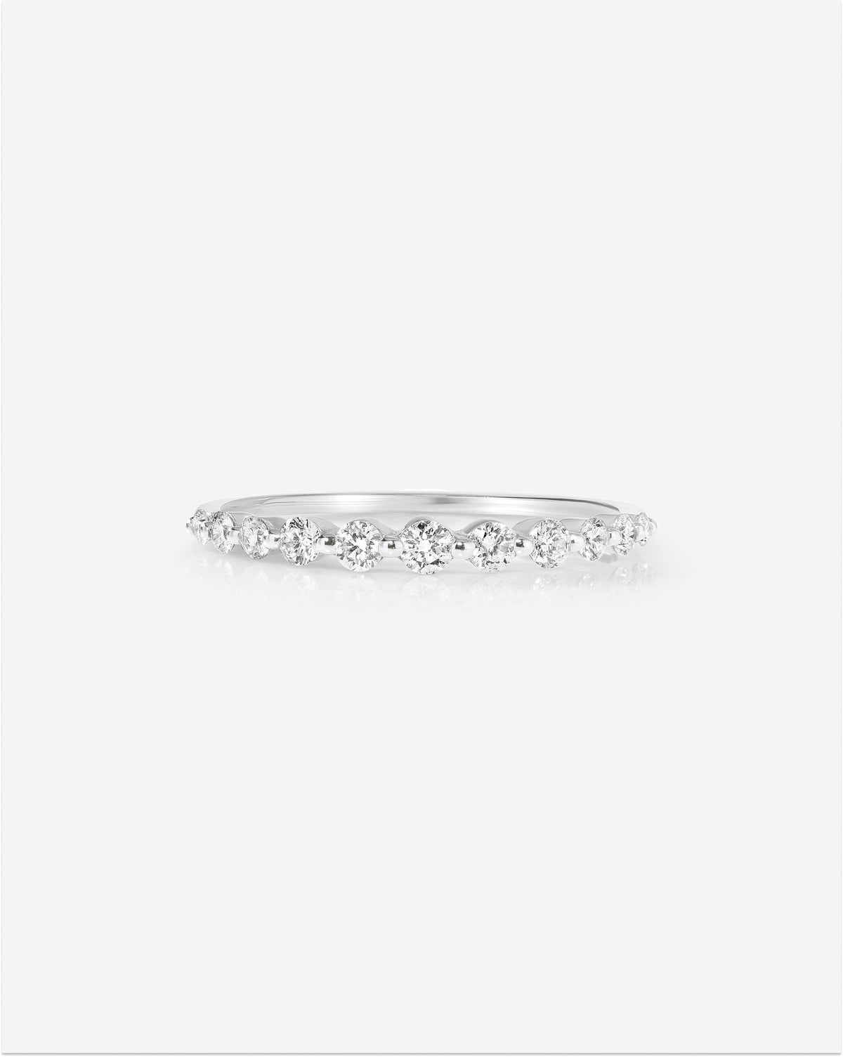 Graduated Single Prong Diamond Ring