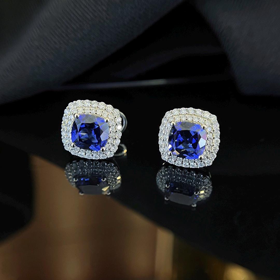 Catching More Than Attention Lab Sapphire Halo Studs