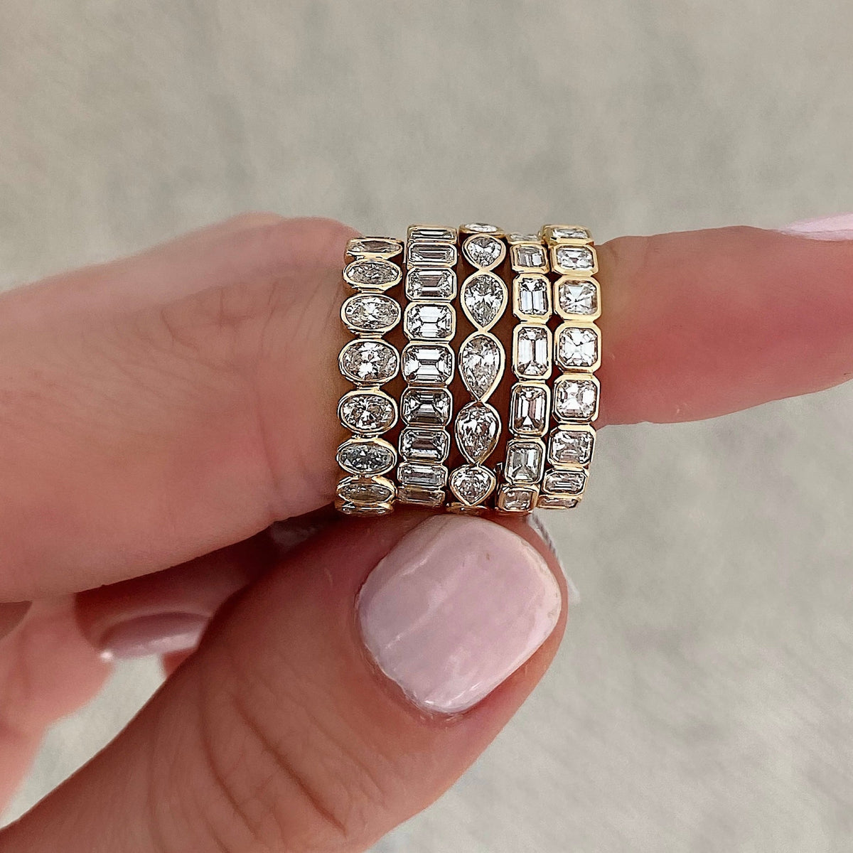Sideways Pear Bezel Eternity Band