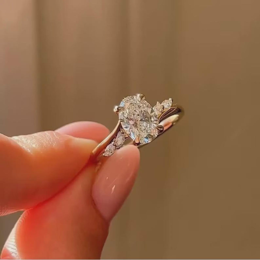 The Ring They'll Ask About Oval CVD Diamond Ring with Marquise Side Stones