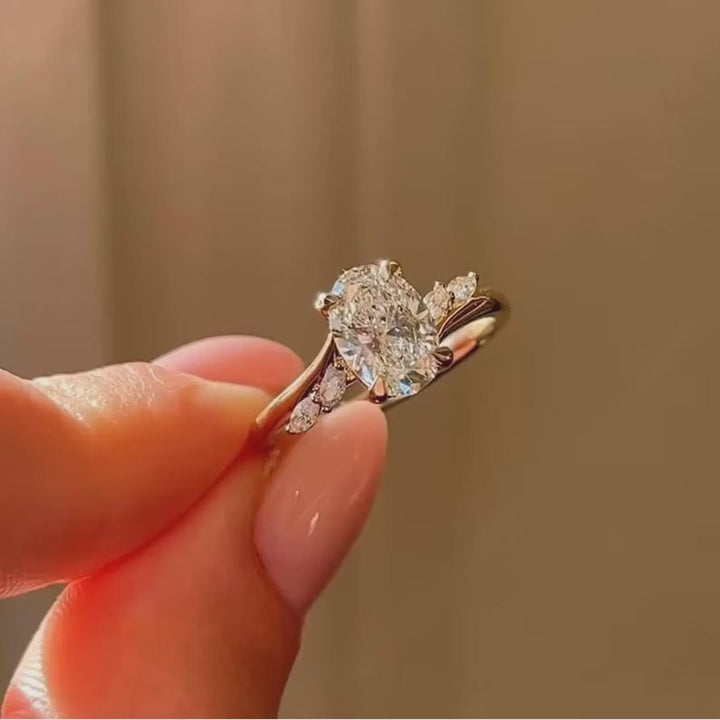 The Ring They'll Ask About Oval CVD Diamond Ring with Marquise Side Stones