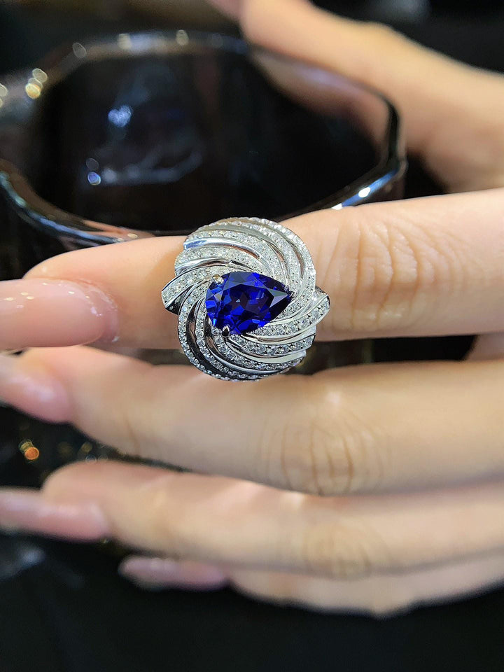 Forever Starts Here Pear Sapphire Swirl Halo Ring