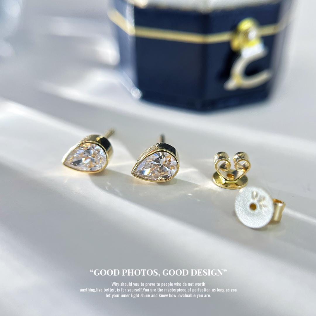 Catching More Than Attention Bezel Diamond Studs
