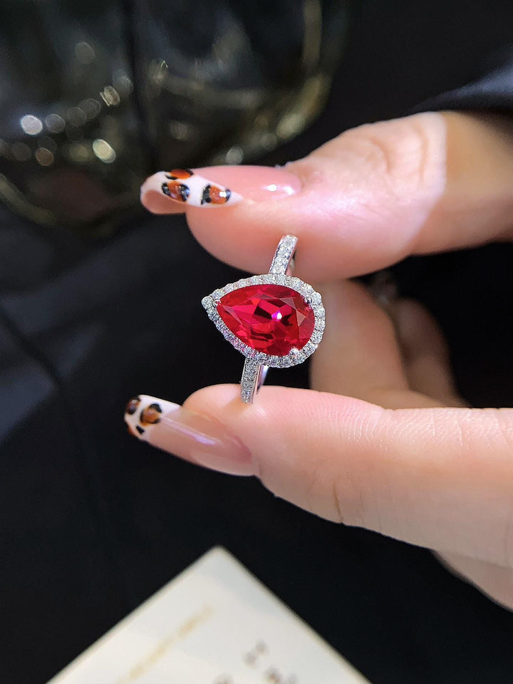 Worth Looking Twice Oval Lab Ruby Diamond Wrap Ring